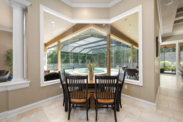 3533 SW 87th Dr, Gainesville, FL 32608 - dining area with a sunroom, decorative columns, baseboards, and crown molding