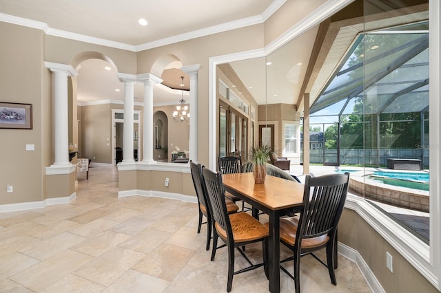 3533 SW 87th Dr, Gainesville, FL 32608 - dining space featuring decorative columns, a sunroom, recessed lighting, crown molding, and baseboards