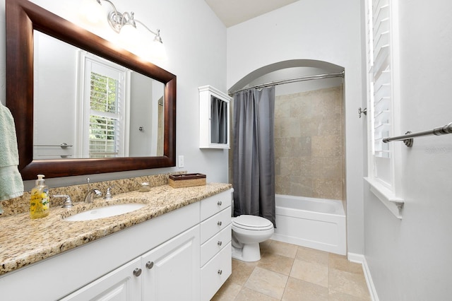 3533 SW 87th Dr, Gainesville, FL 32608 - full bathroom featuring vanity, toilet, shower / bath combo with shower curtain, baseboards, and tile patterned floors