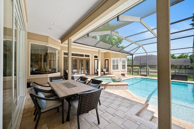 3533 SW 87th Dr, Gainesville, FL 32608 - view of swimming pool with a patio area, french doors, a pool with connected hot tub, and glass enclosure