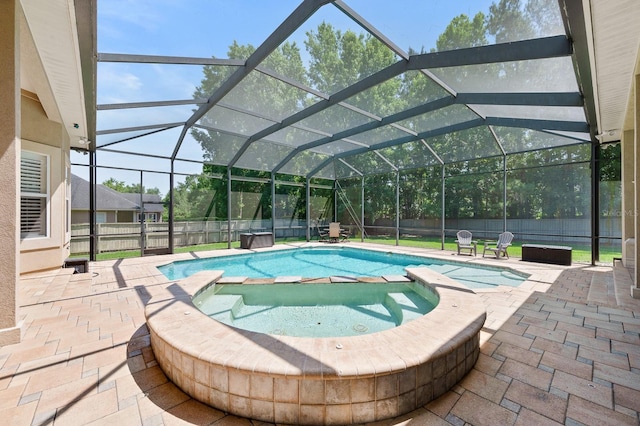 3533 SW 87th Dr, Gainesville, FL 32608 - view of swimming pool featuring a patio, a pool with connected hot tub, and a fenced backyard