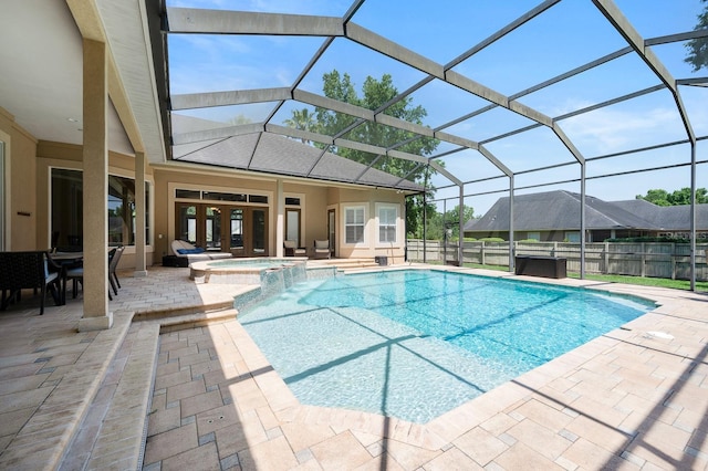 3533 SW 87th Dr, Gainesville, FL 32608 - view of pool featuring a patio area, a pool with connected hot tub, and glass enclosure