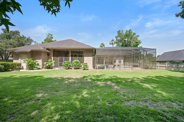 3533 SW 87th Dr, Gainesville, FL 32608 - back of property with stucco siding and glass enclosure