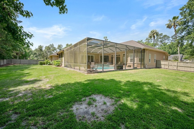 3533 SW 87th Dr, Gainesville, FL 32608 - back of property featuring a lanai, a patio area, and stucco siding