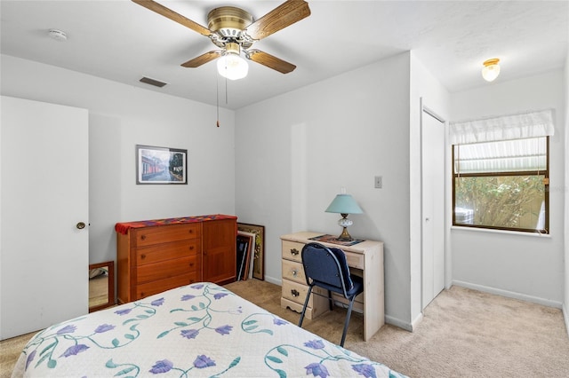 8689 NW 42nd Dr, Gainesville, FL 32653 - carpeted bedroom featuring baseboards, ceiling fan, and a closet
