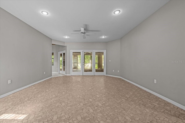 unfurnished room featuring ceiling fan, recessed lighting, and baseboards