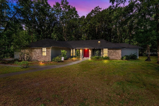 view of front of home with a front yard