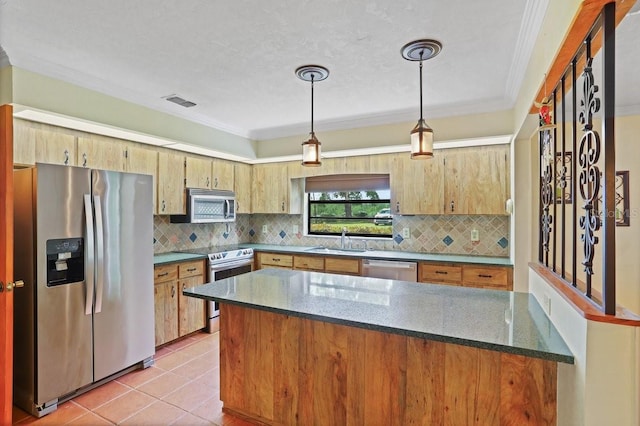 8804 NW 176th Ter, Alachua, FL 32615 - kitchen with appliances with stainless steel finishes, a sink, backsplash, hanging light fixtures, and crown molding