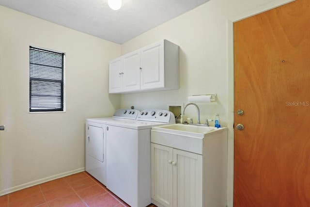 8804 NW 176th Ter, Alachua, FL 32615 - laundry room featuring separate washer and dryer, cabinet space, baseboards, and light tile patterned floors