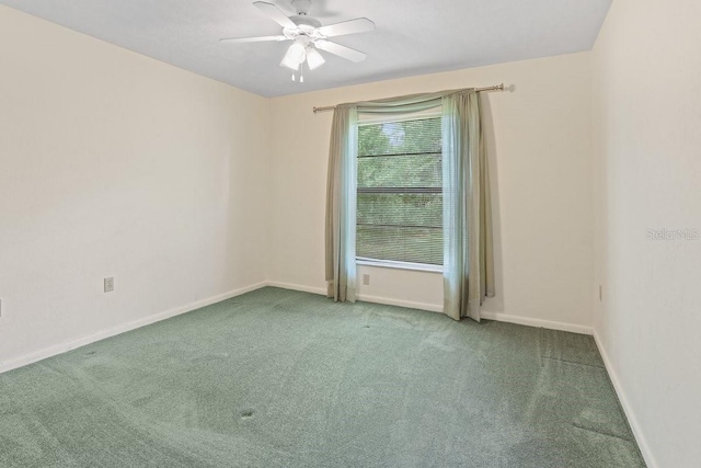8804 NW 176th Ter, Alachua, FL 32615 - carpeted empty room with baseboards and ceiling fan