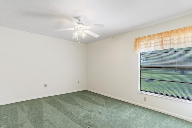 8804 NW 176th Ter, Alachua, FL 32615 - spare room featuring carpet floors, baseboards, and a ceiling fan