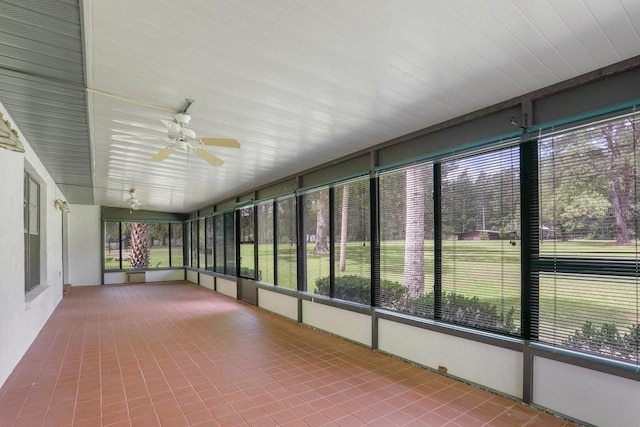 8804 NW 176th Ter, Alachua, FL 32615 - unfurnished sunroom featuring a ceiling fan