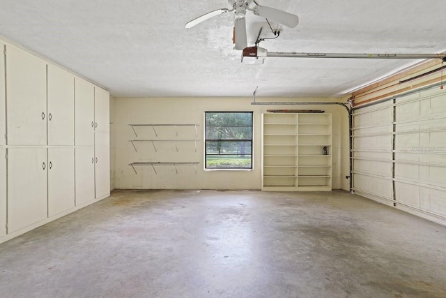 8804 NW 176th Ter, Alachua, FL 32615 - garage featuring a garage door opener and a ceiling fan
