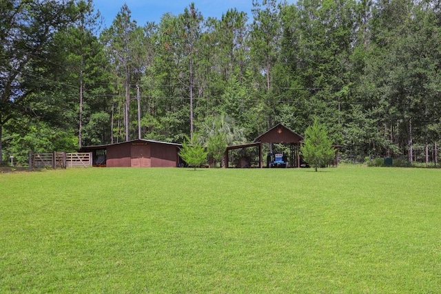 8804 NW 176th Ter, Alachua, FL 32615 - view of yard with a carport, an outdoor structure, and a pole building