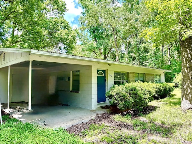 4502 SW 47th Way, Gainesville, FL 32608 - ranch-style home with a carport