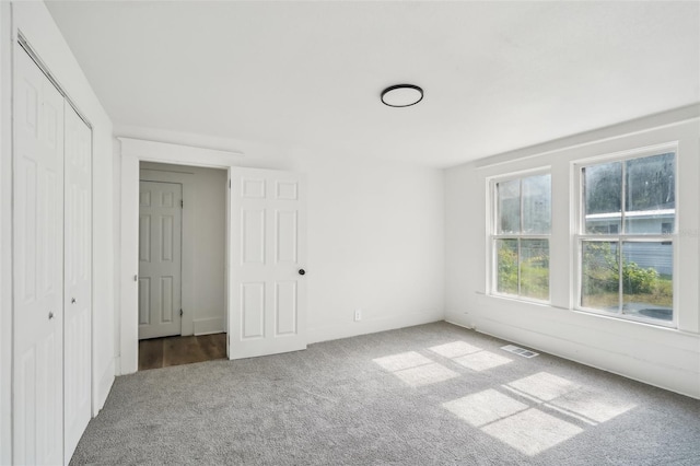 20014 SE 219th Ave, Hawthorne, FL 32640 - unfurnished bedroom with carpet flooring and a closet