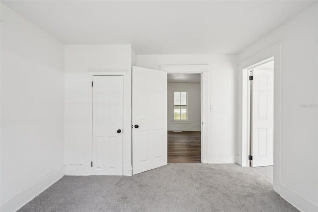 20014 SE 219th Ave, Hawthorne, FL 32640 - unfurnished bedroom with carpet and baseboards
