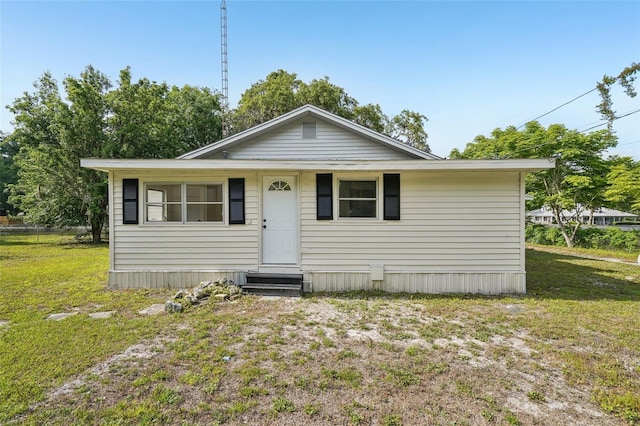 20014 SE 219th Ave, Hawthorne, FL 32640 - view of front of house featuring entry steps and a front lawn