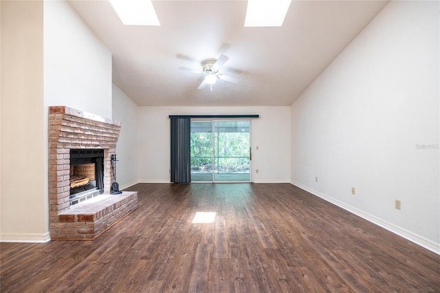 231 NW 48th Blvd Unit 0, Gainesville, FL 32607 - unfurnished living room featuring a skylight, a fireplace, wood finished floors, and baseboards