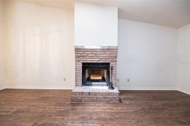 231 NW 48th Blvd Unit 0, Gainesville, FL 32607 - detailed view of a fireplace, wood finished floors, and baseboards