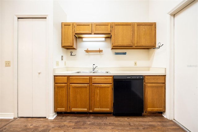 231 NW 48th Blvd Unit 0, Gainesville, FL 32607 - kitchen featuring black dishwasher, a sink, dark wood-type flooring, light countertops, and brown cabinets