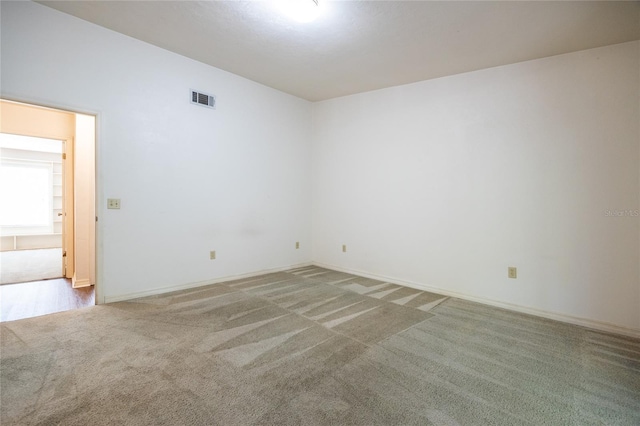 231 NW 48th Blvd Unit 0, Gainesville, FL 32607 - spare room with light colored carpet and baseboards