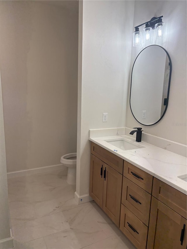 2522 SE 11th Ave, Gainesville, FL 32641 - bathroom featuring marble look tiles and double vanity