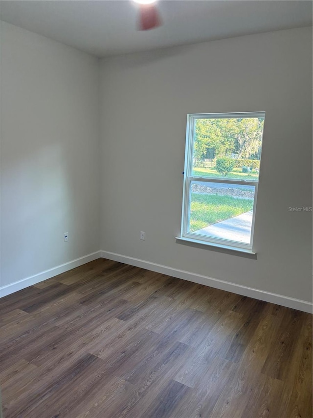 2522 SE 11th Ave, Gainesville, FL 32641 - spare room with dark wood-type flooring