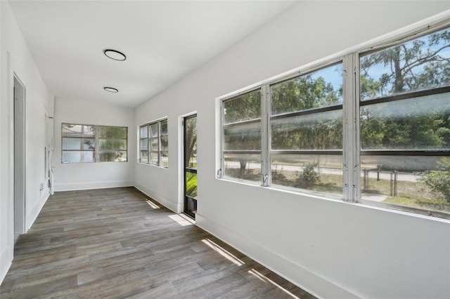 20016 SE 219th Ave, Hawthorne, FL 32640 - unfurnished sunroom with wood finished floors and baseboards