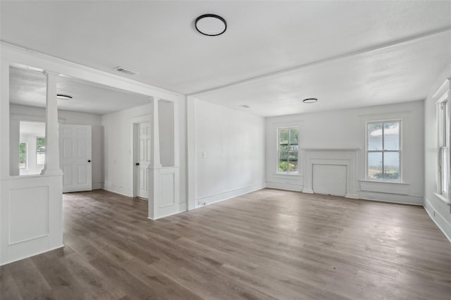 20016 SE 219th Ave, Hawthorne, FL 32640 - unfurnished living room featuring wood finished floors and baseboards