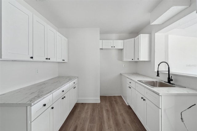 20016 SE 219th Ave, Hawthorne, FL 32640 - laundry room with a sink, dark wood-style flooring, and baseboards