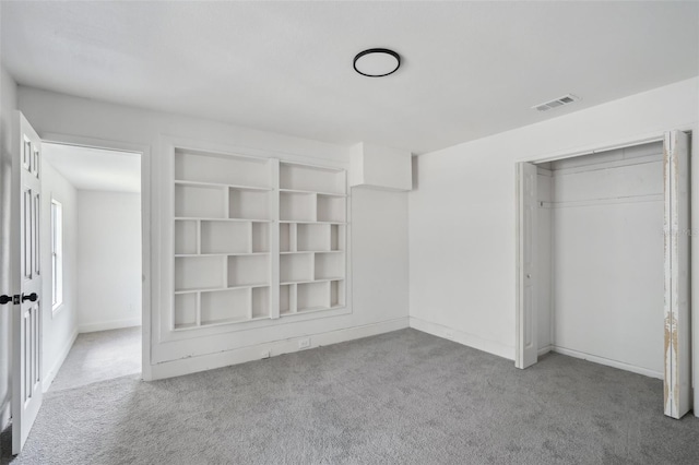 20016 SE 219th Ave, Hawthorne, FL 32640 - unfurnished bedroom with carpet, a closet, and baseboards