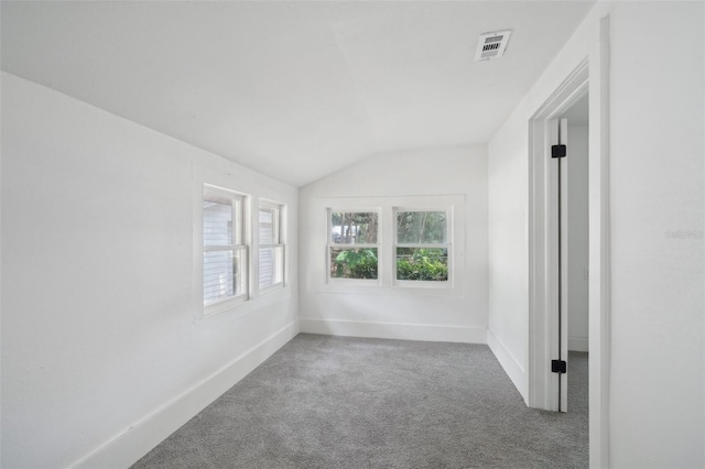 20016 SE 219th Ave, Hawthorne, FL 32640 - carpeted empty room with vaulted ceiling and baseboards