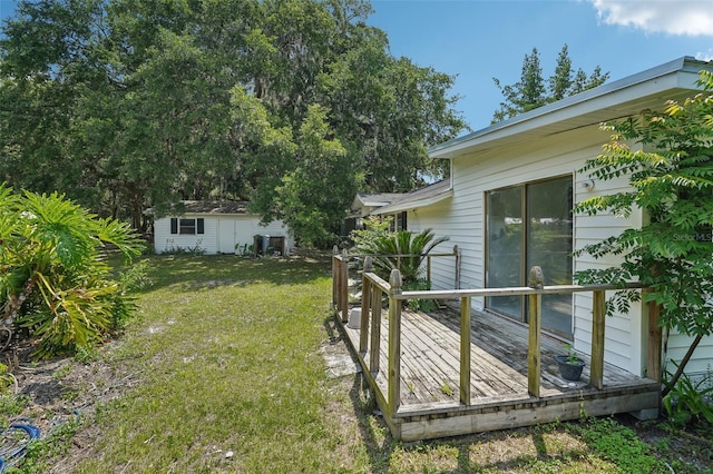 20016 SE 219th Ave, Hawthorne, FL 32640 - view of grassy yard with an outdoor structure and a deck