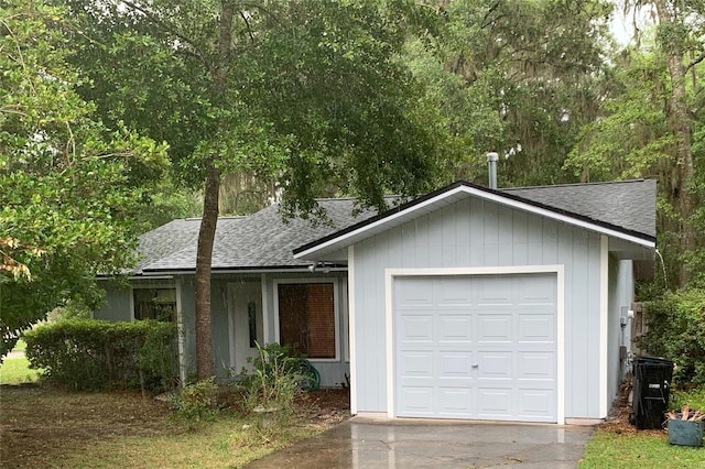3425 NW 48th Ter, Gainesville, FL 32606 - ranch-style home featuring a shingled roof and driveway