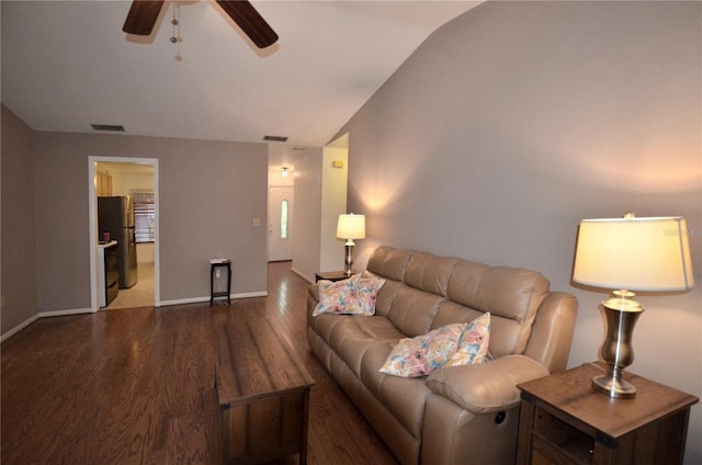 3425 NW 48th Ter, Gainesville, FL 32606 - living area featuring wood finished floors, a ceiling fan, lofted ceiling, and baseboards