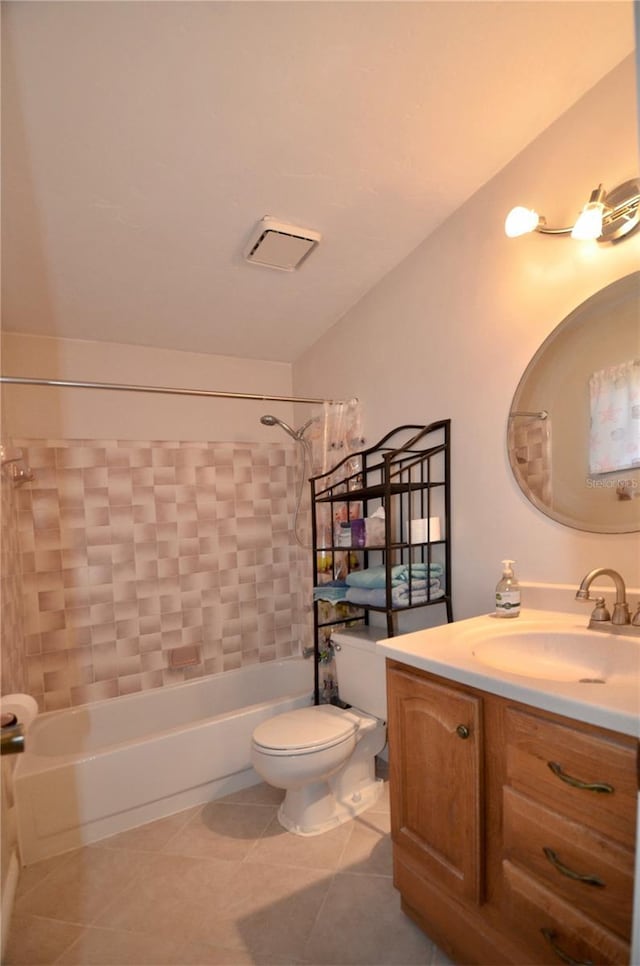 3425 NW 48th Ter, Gainesville, FL 32606 - full bath featuring shower / washtub combination, vanity, toilet, and tile patterned flooring