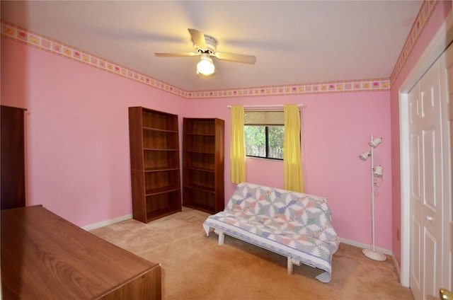 3425 NW 48th Ter, Gainesville, FL 32606 - sitting room with light carpet, ceiling fan, and baseboards