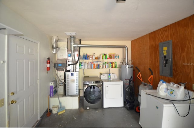 3425 NW 48th Ter, Gainesville, FL 32606 - washroom featuring electric panel, washing machine and clothes dryer, and water heater