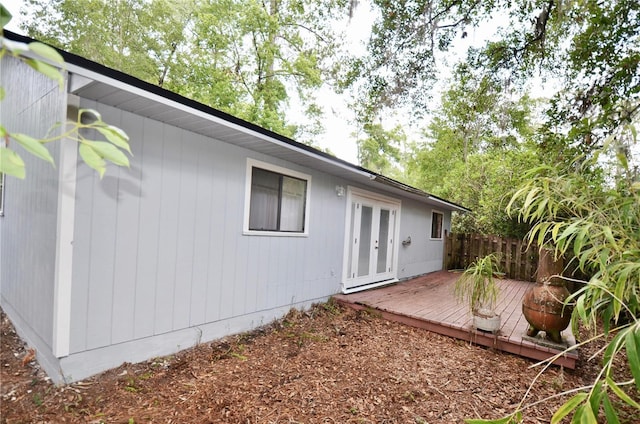 3425 NW 48th Ter, Gainesville, FL 32606 - rear view of property with a wooden deck and french doors