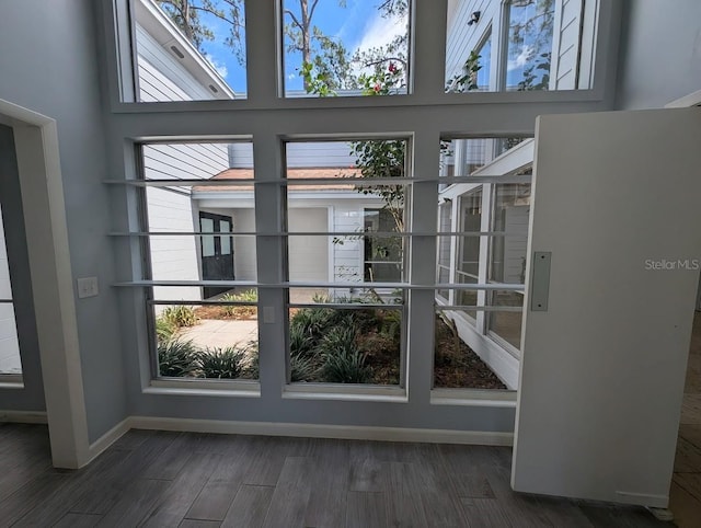 6015 SW 35th Way, Gainesville, FL 32608 - detailed view of wood finished floors and baseboards