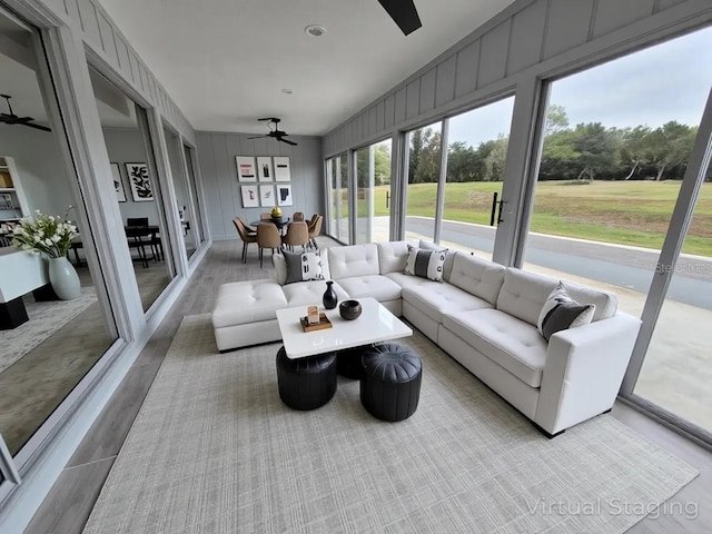 6015 SW 35th Way, Gainesville, FL 32608 - sunroom / solarium with a ceiling fan, an outdoor living space, and outdoor dining space