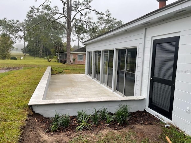 6015 SW 35th Way, Gainesville, FL 32608 - wooden deck featuring a lawn