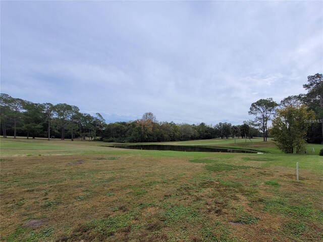 6015 SW 35th Way, Gainesville, FL 32608 - view of grassy yard featuring a water view