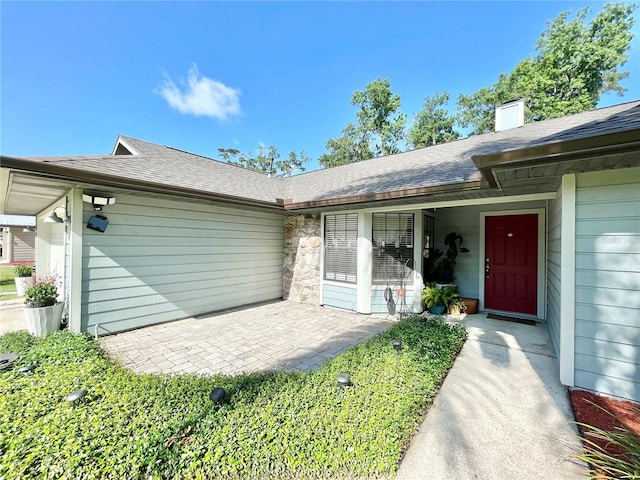4370 NW 60th Ter, Gainesville, FL 32606 - entrance to property featuring roof with shingles