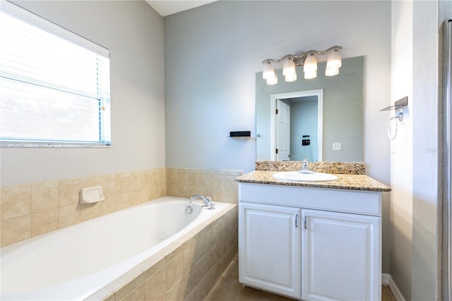 528 NW 39th Rd Unit 101, Gainesville, FL 32607 - full bath featuring vanity and a bath
