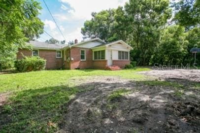 1627 NW 8th Ave, Gainesville, FL 32603 - view of front of property featuring a front lawn