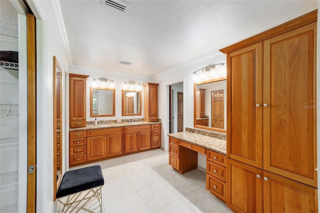 6015 SW 36th Way, Gainesville, FL 32608 - bathroom with crown molding, vanity, tile patterned flooring, and a walk in closet