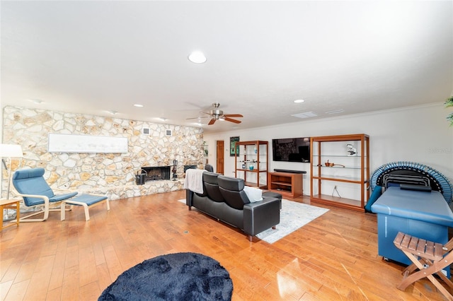 6015 SW 36th Way, Gainesville, FL 32608 - living area with a fireplace, ceiling fan, ornamental molding, hardwood / wood-style flooring, and recessed lighting
