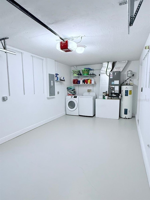 1425 S Central Ave, Flagler Beach, FL 32136 - garage with electric water heater, independent washer and dryer, a garage door opener, electric panel, and heating unit